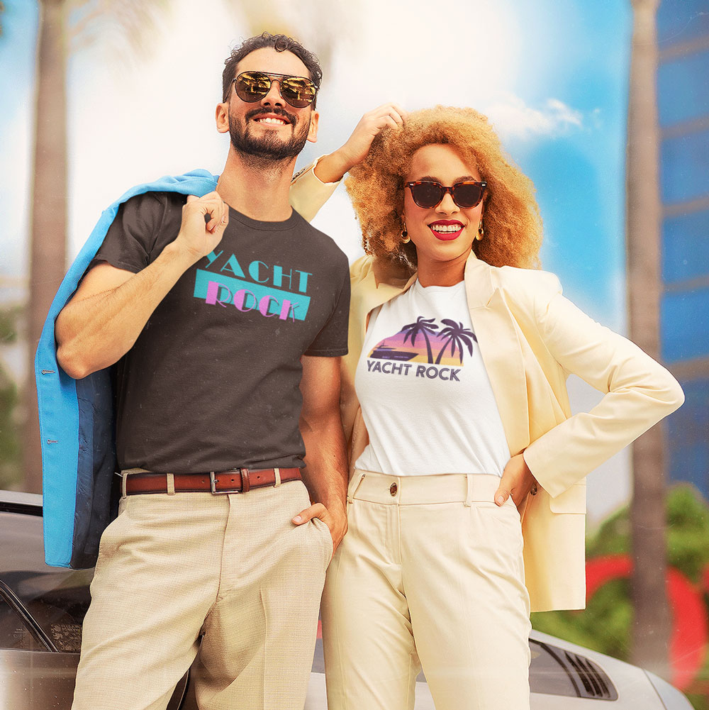 A couple dressed in 80's attire with Yacht Rock Clothing tee shirts.